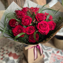Load image into Gallery viewer, semi compact bouquet of 24 red roses for valentines day from Bits and Buds florist in Leighton Buzzard