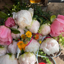 Load image into Gallery viewer, Bouquet of flowers with pink, white, and yellow peonies on a wooden surface. british flowers at bits and buds bedfordshire florist seasonal workshop