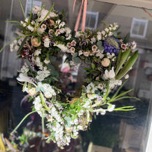 Load image into Gallery viewer, heart shaped real flowers spring wreath with speckled eggs and hyacinth bulbs on a door at bits and buds florist leighton buzzard floristry workshop