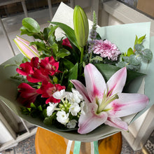 Load image into Gallery viewer, Bouquet of pink white and red flowers on a table outdoors at Bits and Buds florist Leighton Buzzard. With scented lily flowers available for delivery and online shopping 
