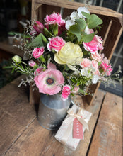 Load image into Gallery viewer, pink and cream flowers presented in a metal milk churn with a box of chocolates from bits and buds luxury florist in Leighton Buzzard
