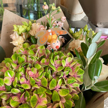 Load image into Gallery viewer, bouquet of flowers with a wooden butterfly bee with a smiley face delivered across bedforsdhire florist
