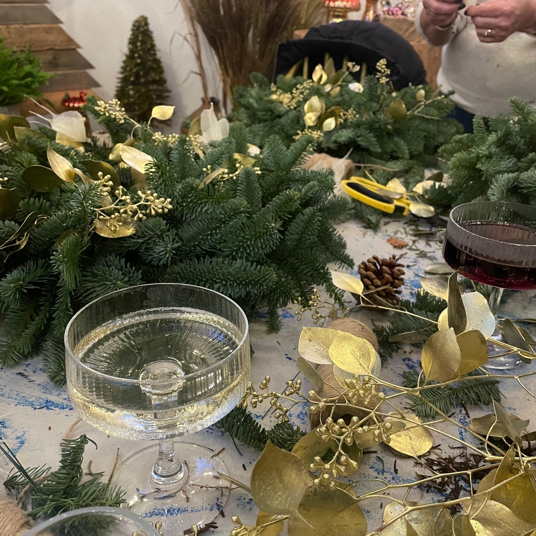 champagne and mulled wine refreshments at bits and buds christmas door wreath workshop in leighon buzzard gold eucalyptus christmas decorations 