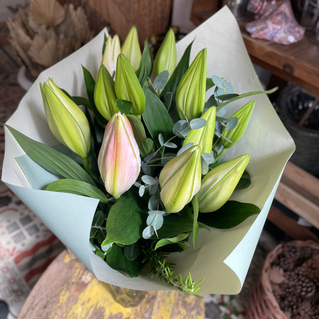 lily bouquet of oriental lilys presented in elegant paper from bits and buds florist leighton buzzard