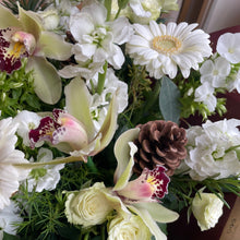 Load image into Gallery viewer, Bouquet of white and green flowers with a pine cone and luxury orchids from bits and buds florist bedfordshire
